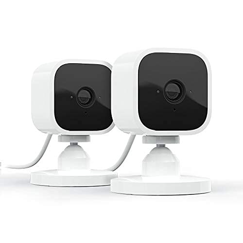 Blink Mini - Compact indoor plug-in smart security camera, 1080p HD video, night vision, motion detection, two-way audio, easy set up, Works with Alexa – 2 cameras (White)