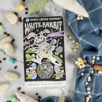 Bones Coffee Company White Rabbit Flavored Coffee Beans, Medium Roast Ground Coffee Low Acid, White Chocolate Flavor (12 oz)