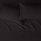 Amazon Basics Lightweight Super Soft Easy Care Breathable Microfiber 4 Piece Cozy Comfortable Bed Sheet Set, Wrinkle Resistant with 14-Inch Deep Pockets, Queen, Black, Solid