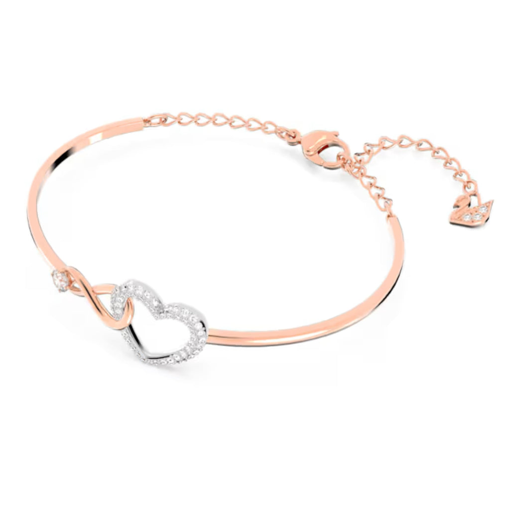 Swarovski Hyperbola Women's Bangle Bracelet with a Rose-Gold Tone Plated Bangle, Clear Crystals and Lobster Clasp