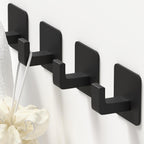 GWAAZXGZ Square Self Adhesive Towel Hooks - 4 Pack Matte Black Metal Hooks, Right-Angle Design for Towels, Robes & Hats, Organize Bathroom, Kitchen, Entryway, Doors, Cabinets on Smooth Surfaces