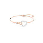 Swarovski Hyperbola Women's Bangle Bracelet with a Rose-Gold Tone Plated Bangle, Clear Crystals and Lobster Clasp