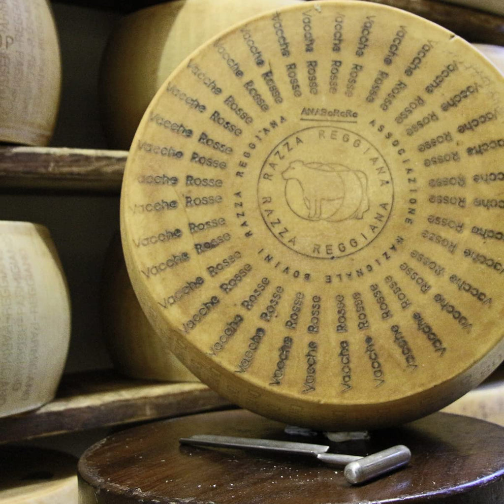 Parmigiano Reggiano PDO "Vacche Rosse/Red Cows" Seasoned 24 Months, 2,2 lbs (kg.1). Produced Directly by Consorzio Vacche Rosse (Red Label)