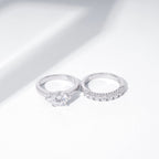 Amazon Essentials Sterling Silver Platinum Plated, Infinite Elements, Cubic Zirconia, Three Stone Ring with Matching Wedding Band, Size 7