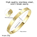 BOLAGTIER 14K Gold Plated Four Leaf Clover Bangle Bracelet (Gold-M)