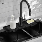 Meiliweser Silicone Faucet Mat for Kitchen Sink – Gen 3 10° Slope Splash Guard with Cuttable Hole – 14” x 5.5” Drip Catcher & Sponge Holder for Kitchen, Bathroom (Black)