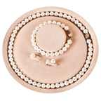 Pearl Necklace Set, featuring an exquisite bracelet, stud earrings, and necklace. This pearl necklace, bracelet, and ring ensemble radiates elegant charm, effortlessly elevating the sophistication of everyday attire. Perfect for weddings, banquets, or bir