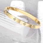 BOLAGTIER 14K Gold Plated Four Leaf Clover Bangle Bracelet (Gold-M)