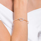 Swarovski Hyperbola Women's Bangle Bracelet with a Rose-Gold Tone Plated Bangle, Clear Crystals and Lobster Clasp