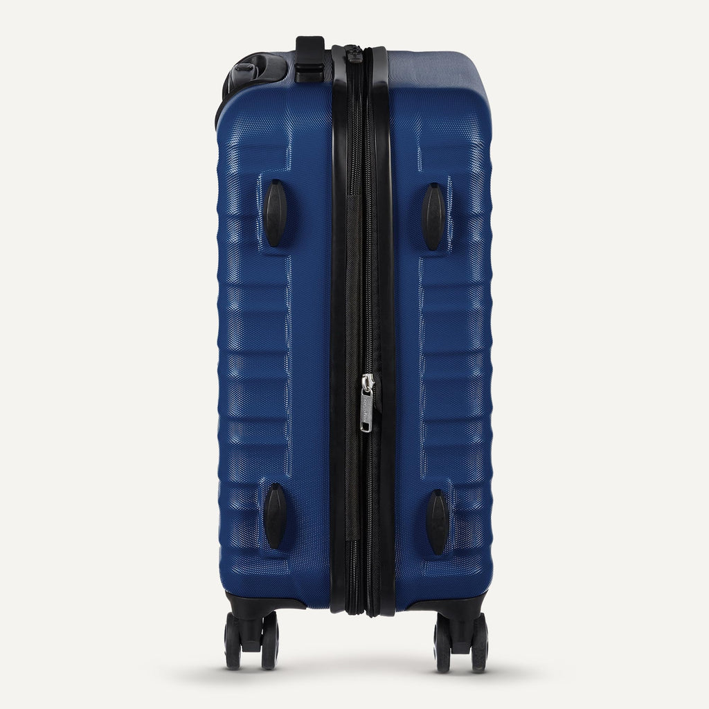 Amazon Basics 21" Hardside Carry-On Luggage with Multi-directional Wheels, Expandable for Up to 25% More Space, Scratch-Resistant Surface, Organized Interior, Navy Blue