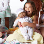 JC Toys - La Baby - Hispanic 20-inch Large Soft Body Baby Doll - Washable - Removable Purple Outfit with Hat and Pacifier - For Children 2 Years and up