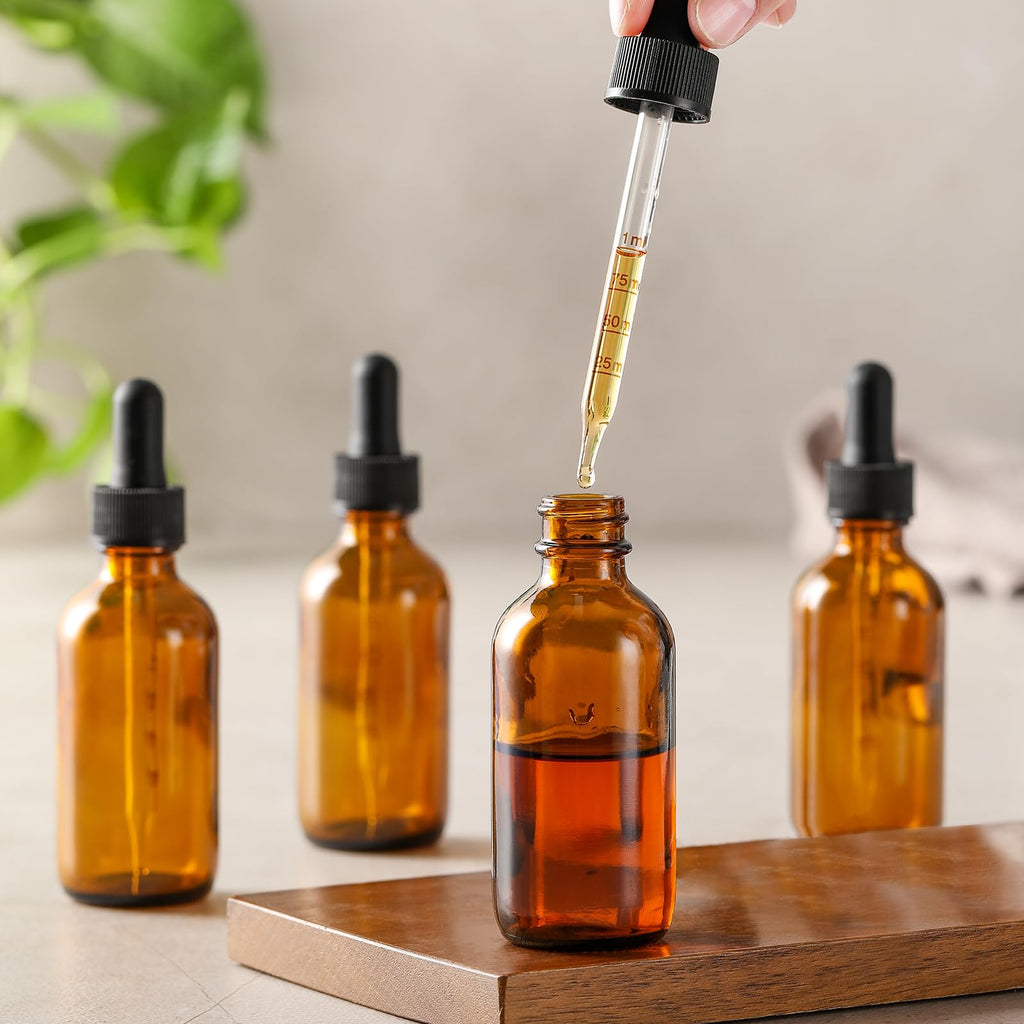 4 Pack 1 oz Glass Dropper Bottles with Measured Dropper - 30ml Dark Amber Tincture Bottles with Graduated Calibrated Glass Eye Droppers (1ml) for Essential Oils, Liquids - Leakproof Travel Bottles