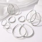 Gacimy Silver Chunky Hoop Earrings for Women, 14K White Gold Plated Oval Hoop Medium Silver Earrings with 925 Sterling Silver Post