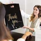 Jutieuo 100 Pack Black Thank You Shopping Bags for Small Business - 12"x15" Extra Thick 2.36 Mil Plastic Retail Thank You Bags with Handles for Stores, Boutique, Clothes, Business Gift