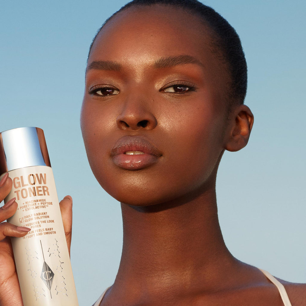 Charlotte Tilbury Glow Face Toner Mini - Exfoliating Toner for Oily Skin - Helps to Reduce The Appearance of Pores, Hydrate & Plump Skin - Delicately Scented with Rose & Lemon (30ml)