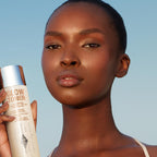 Charlotte Tilbury Glow Face Toner Mini - Exfoliating Toner for Oily Skin - Helps to Reduce The Appearance of Pores, Hydrate & Plump Skin - Delicately Scented with Rose & Lemon (30ml)