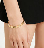LUCSIS Waterproof 18K Gold PVD Plated Bracelet for Women, Non-Tarnish Stainless Steel Bangle with Engraved Cross Pattern and 5A Cubic Zirconia, Trendy Jewelry Gift for Her (Gold, M/L)