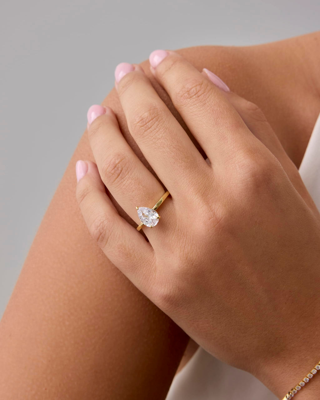 PAVOI 14K Yellow Gold Plated Simple 2.5CT Pear CZ Hidden Halo Eternity Band