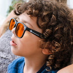 DefenderShield Blue Light Glasses For Kids – Kids Blue Light Glasses Girls and Boys With Orange Lenses (99% Blue Light Blocking) For Screens – Lightweight, Flexible & Shatterproof Black Fit Frames