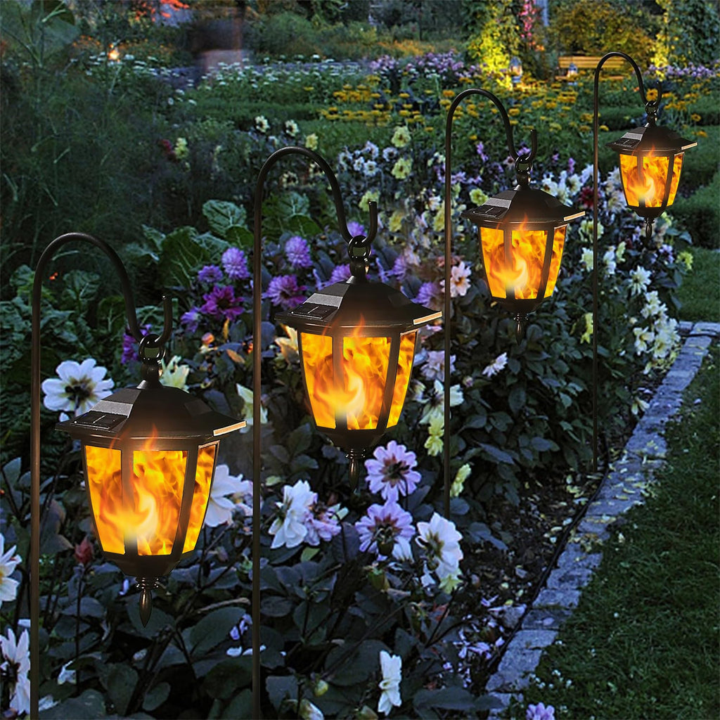 Dynaming 4 Pack Solar Flame Hanging Lights Outdoor, Halloween Solar Flickering Flame LED Garden Lanterns with 4 x 38 Inch Shepherd Hooks, Christmas Lighting for Lawn Patio Yard Pathway Driveway