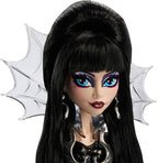 Monster High Doll, Elvira, Mistress of The Dark Collectible in Black Faux Leather Dress with Silvery Batwing Cape and Premium Accessories