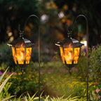 Dynaming 2 Pack Solar Flame Hanging Lights Outdoor, Halloween Solar Flickering Flame LED Garden Lanterns with 2 x 38 Inch Shepherd Hooks, Christmas Lighting for Lawn Patio Yard Pathway Driveway