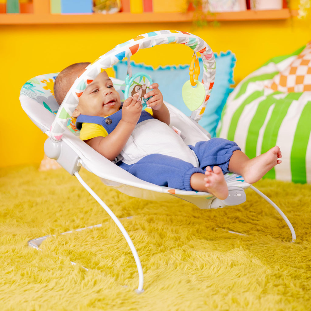 Bright Starts Baby Bouncer Soothing Vibrations Infant Seat - Removable -Toy Bar, Nonslip Feet, 0-6 Months Up to 20 lbs (Safari Fun)