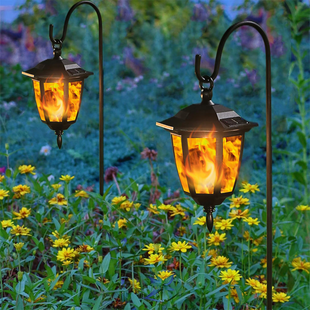 Dynaming 4 Pack Solar Flame Hanging Lights Outdoor, Halloween Solar Flickering Flame LED Garden Lanterns with 4 x 38 Inch Shepherd Hooks, Christmas Lighting for Lawn Patio Yard Pathway Driveway