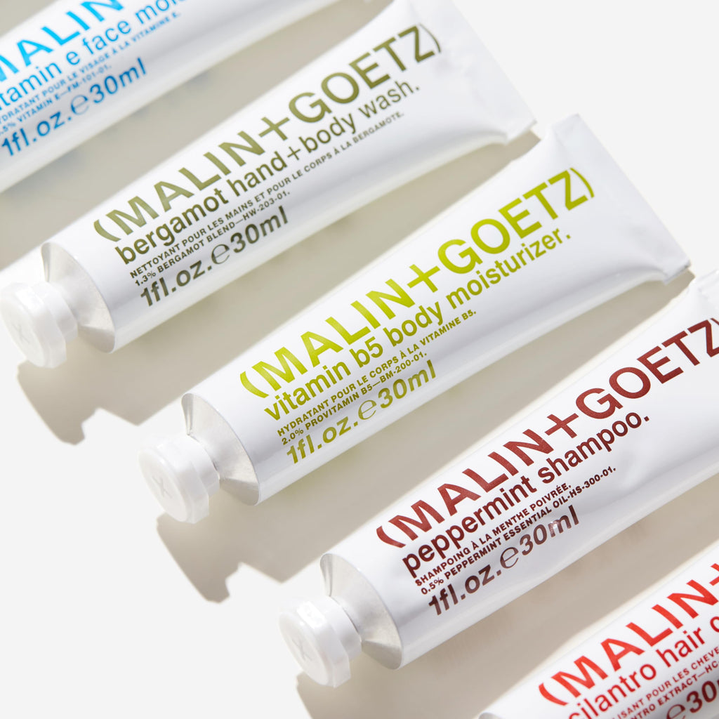 MALIN+GOETZ Best-Sellers Travel Kit | Six Everyday Essentials for Face, Body + Hair | Grapefruit Face Cleanser, Vitamin E Face Moisturizer, Peppermint Shampoo + More | Vegan, Travel-Friendly(6 x 1 oz)