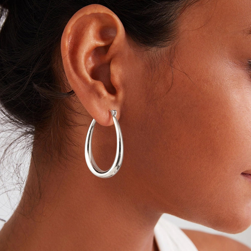 Gacimy Silver Chunky Hoop Earrings for Women, 14K White Gold Plated Oval Hoop Medium Silver Earrings with 925 Sterling Silver Post