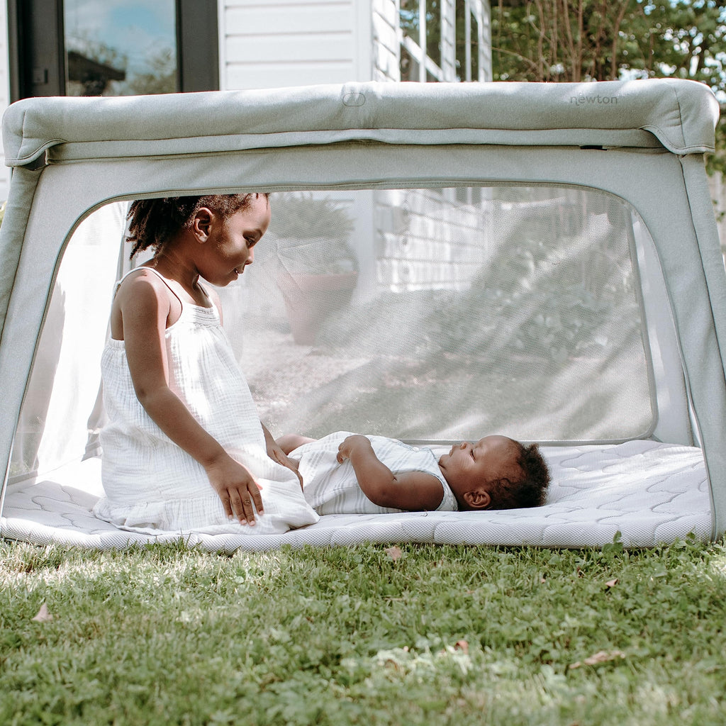 Newton Baby Travel Crib and Play Yard - 2023 Closeout Model | Safe, Breathe-Thru Mattress | Completely Washable | Largest-in-Class with Travel Bag