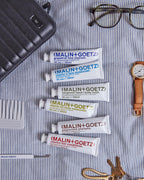 MALIN+GOETZ Best-Sellers Travel Kit | Six Everyday Essentials for Face, Body + Hair | Grapefruit Face Cleanser, Vitamin E Face Moisturizer, Peppermint Shampoo + More | Vegan, Travel-Friendly(6 x 1 oz)